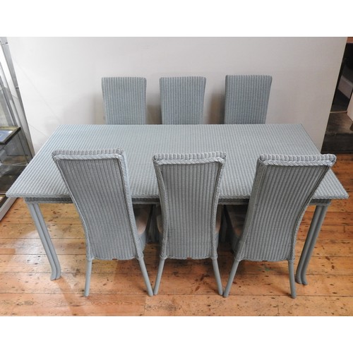 99 - A PALE BLUE LLOYD LOOM TABLE AND SIX MATCHING HIGH BACK CHAIRS, the chairs with maker's brass tags a... 