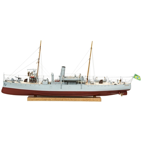 203 - A KIT BUILT MODEL OF A BRAZILIAN NAVY GUN BOAT CIRCA WWI with detailed super structure and displayed... 