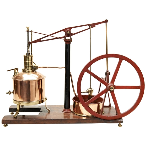 157 - AN ENGINEERED MODEL OF A BEAM PUMPING ENGINE with copper and brass boiler and pumping pond mounted o... 