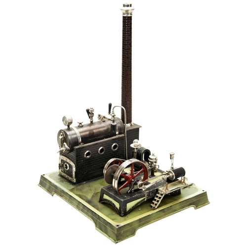 168 - A STATIONARY STEAM ENGINE, PROBABLY FLEISCHMANN the brick effect boiler housing with detachable chim... 