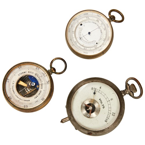 130 - A POCKET BAROMETER C1900 the partially worn gilt case with circular aperture, the silvered dial mark... 