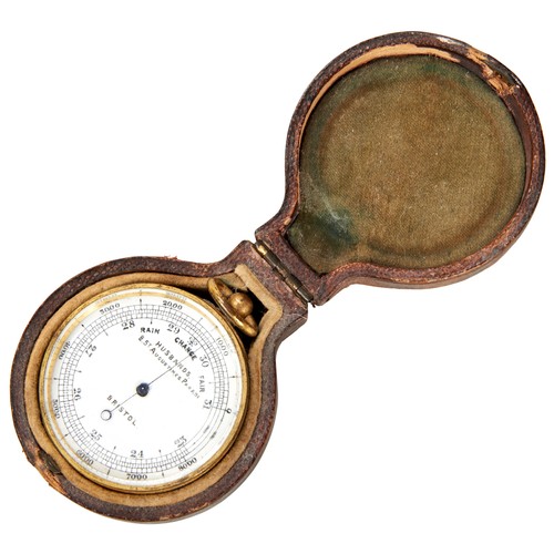 129 - A POCKET BAROMETER C1900 the gilt case with swing loop the face with retailers mark for ‘Husbands 8 ... 