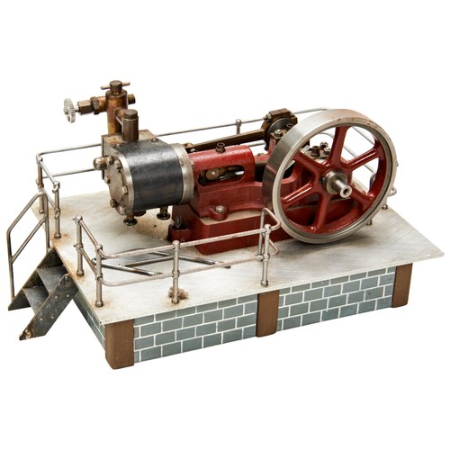 161 - A STUART MODEL OF A HORIZONTAL STEAM 'MILL' ENGINE mounted on a raised platform base with railings a... 