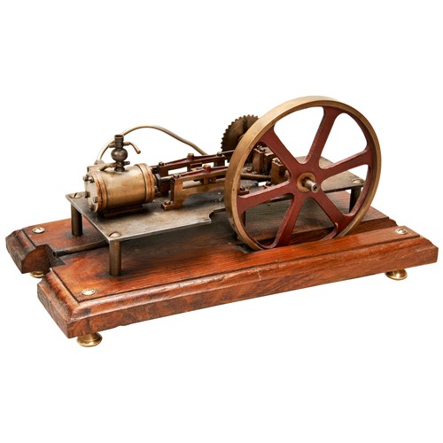 164 - AN ENGINEERED MODEL OF A HORIZONTAL STEAM ENGINE with a sprocket drive wheel.33 cms long maxPROVENAN... 