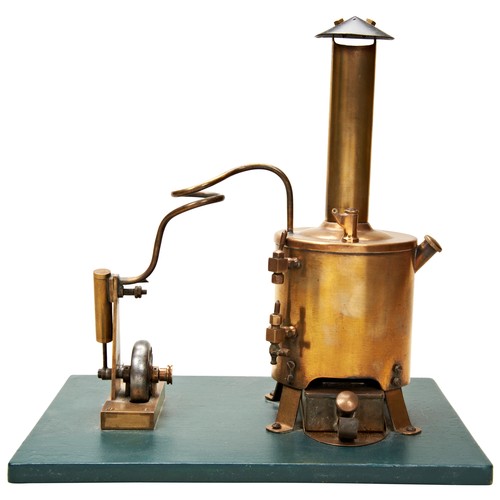 167 - A VERTICAL BRASS STEAM BOILER WITH TALL CHIMNEY and small piston with a heavy drilled steel flywheel... 