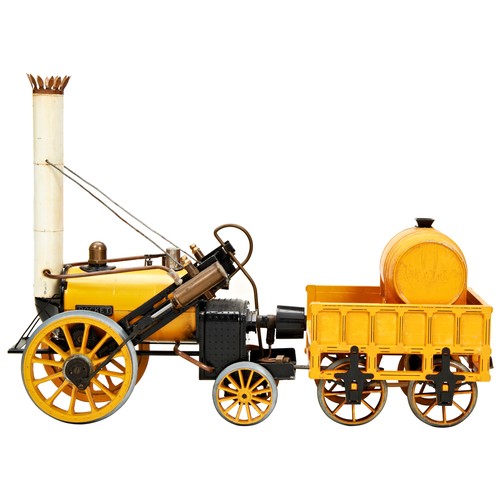 173 - A HORNBY LIVE STEAM 3 1/2 INCH GAUGE STEPHENSON'S ROCKET AND TENDER and a box of track.Play worn.PRO... 