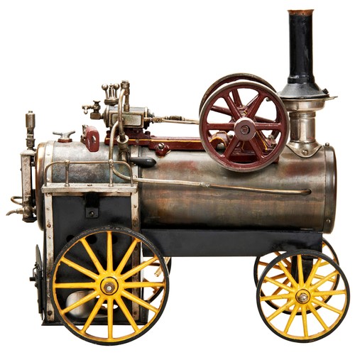 178 - A STEAM TOY TRACTION FARM ENGINE probably German and dating from the mid-20th century, some repainti... 