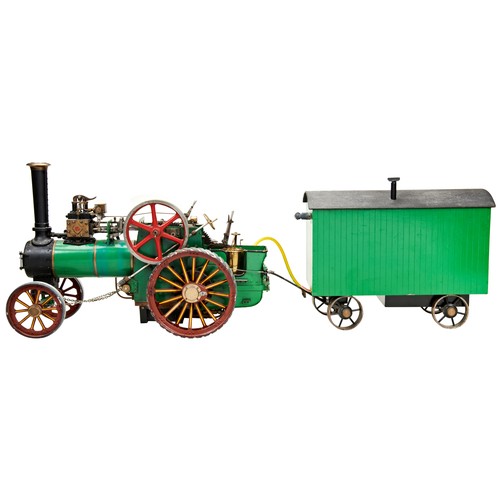 179 - AN ENGINEERED KIT MODEL OF A LIVE STEAM TRACTION ENGINE nicely detailed with a showmans trailer hous... 