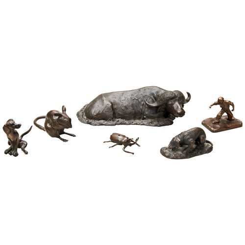 314 - A BRONZE FIGURE OF A DOG MARKED MENE a modern bronze figure of a water buffalo and other modern bron... 