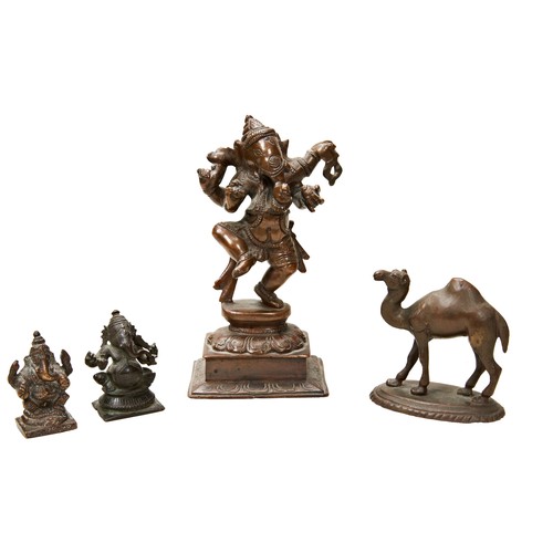 320 - AN INDIAN BRONZE FIGURE OF GANESH two smaller bronze figures of Ganesh and a brass camel.15 cms maxP... 