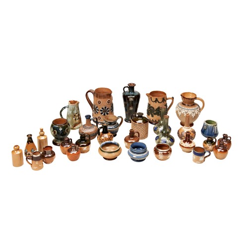 324 - A COLLECTION OF DOULTON LAMBETH SALTGALZED MINIATURES including jugs, mugs and vases, a match pot. A... 