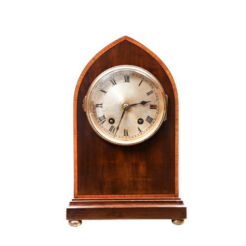 386 - AN EDWARDIAN GEORGE III STYLE ARCHED TOP MAHOGANY MANTEL CLOCK with slivered dial.27 cms highPROVENA... 