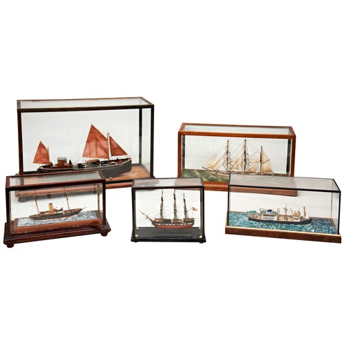 201 - A SMALL CASED MODEL OF A COASTAL BARQUE a model of a schooner ‘Favell’, and four other cased models ... 