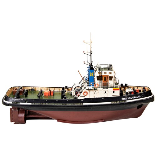 202 - A KIT BUILT WOODEN MODEL OF A TUG 'THE SMIT NEDERLAND' with detailed deck accessories and housed in ... 