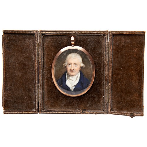 295 - MINIATURE PORTRAIT OF A GEORGIAN GENTLEMAN in a yellow metal oval frame, the reverse with woven hair... 