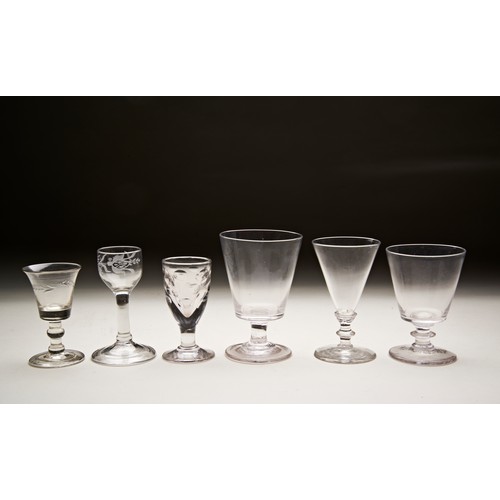 336 - A GEORGIAN CORDIAL GLASS WITH FOLDED FOOT Foot and simple engraving, a small folded foot glass, a th... 