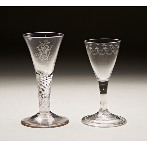 335 - A GEORGIAN SPIRAL TWIST CORDIAL GLASS with engraved initials and another cordial glass with swag eng... 