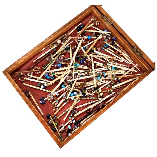 356 - A GOOD COLLECTION OF BONE AND WOODEN LACE BOBBINS, mostly 19th Century and variously decorated and e... 