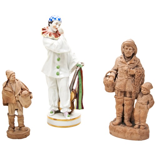 352 - A POTTERY FIGURE OF A PIERROT possibly Italian and two Continental pottery figures, one of a fisherm... 