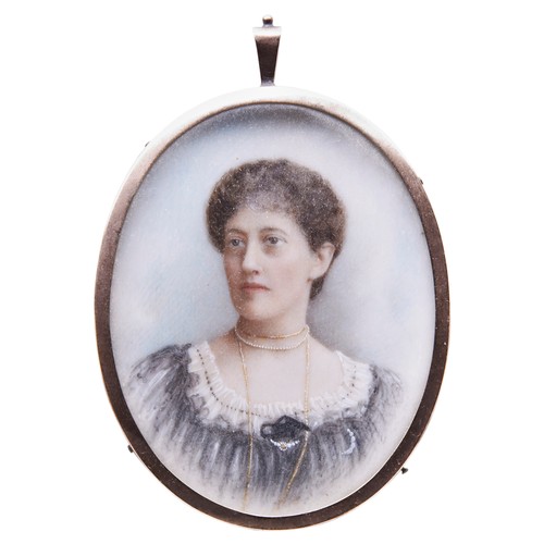 298 - MINIATURE PORTRAIT OF A YOUNG GIRL in a circular brass frame, early 20th century and a miniature por... 