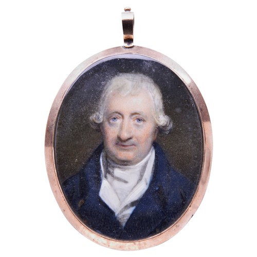 295 - MINIATURE PORTRAIT OF A GEORGIAN GENTLEMAN in a yellow metal oval frame, the reverse with woven hair... 