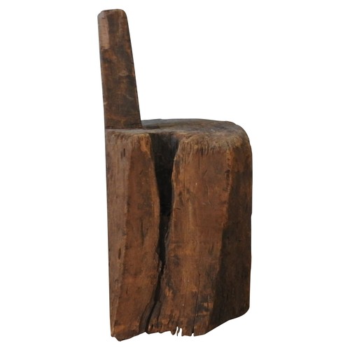 605 - INDONESIAN WOODEN BLOCK MORTAR with circular aperture and side bar52 H X 37 W X 48 D cms