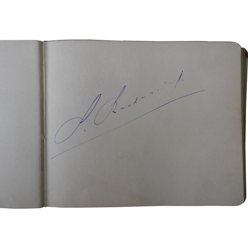 497 - A 1930'S AUTOGRAPH ALBUM, including signatures from Rachmaninoff, Paul Robeson, Jean Batten, Arthur ... 