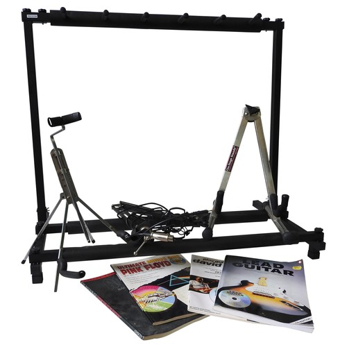 527 - A FOLDING RACK STAND FOR FIVE GUITARS two single guitar stands, a desk top adjustable microphon... 