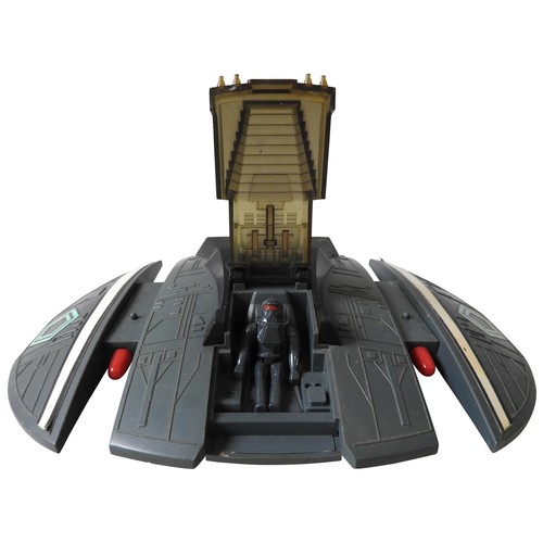 511 - A MATTEL BATTLESTAR GALACTICA CYLON RAIDER with Cylon pilot and expanding wings revealing two missil... 