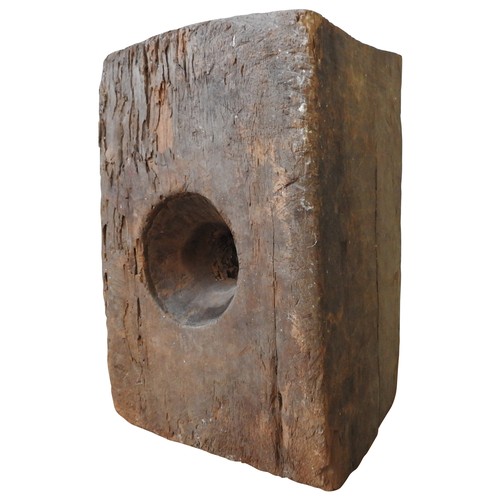 606 - INDONESIAN WOODEN BLOCK MORTAR with singular circular aperture73 H X 52 W X 39 D cms