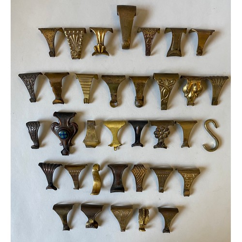 447 - A COLLECTION OF VICTORIAN AND EDWARDIAN PICTURE RAIL HANGERS including an Art Nouveau Ruskin ceramic... 