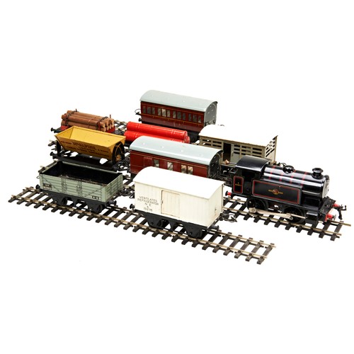 188 - A HORNBY 'O' GAUGE 0-4-0 CLOCKWORK LOCO IN BR LIVERY various rolling stock and assorted trackPROVENA... 