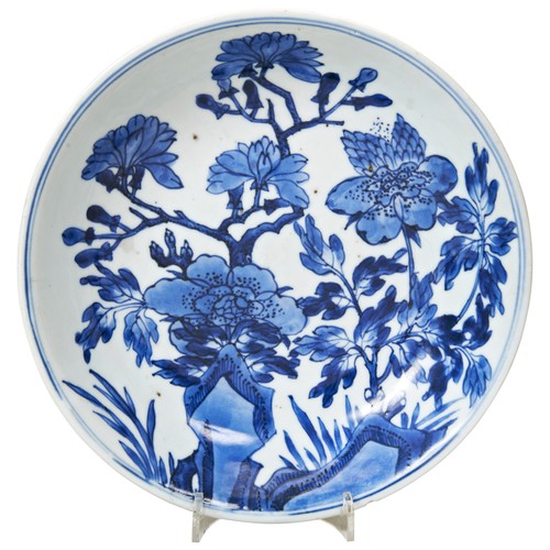 445 - BLUE AND WHITE 'PEONY' DISH XUANDE FOUR CHARACTER MARK BUT 18TH CENTURYthe circular dish painted in ... 