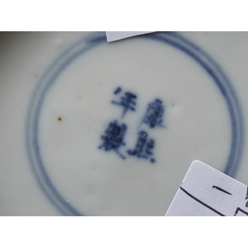 98 - THREE BLUE AND WHITE SAUCER DISHESQING DYNASTY, 18TH CENTURYeach painted in tones of underglaze blue... 