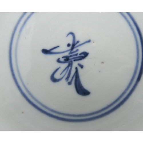 112 - BLUE AND WHITE DISHKANGXI PERIODdensely painted in tones of underglaze blue with blossoming leafy st... 