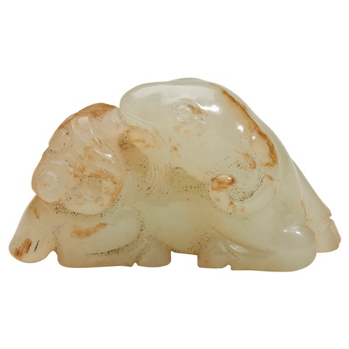 340 - WHITE JADE RAMQING DYNASTY, 18TH CENTURYThe recumbent ram with its front legs bent and head turned l... 