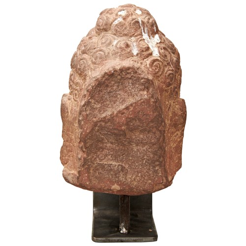 506 - A MOTTLED SANDSTONE HEAD OF THE GUPTA BUDDHA, NORTHERN INDIA, MATHURA, this classic rendition of the... 