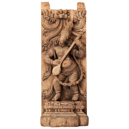 509 - A GOOD CARVED WOODEN ARCHITECTURAL PANEL DEPICTING A HINDU COW-HEADED GODDESS,18TH OR EARLY 19TH CEN... 