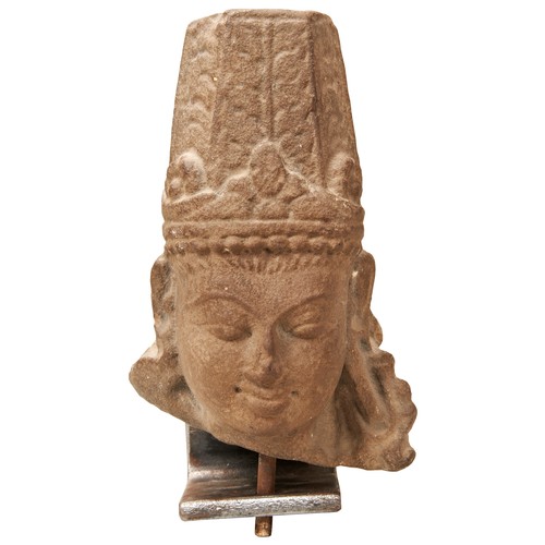 511 - A CARVED SANDSTONE HEAD OF VISHNU, NORTHERN INDIAN, the clearly defined face with pursed lips and wi... 