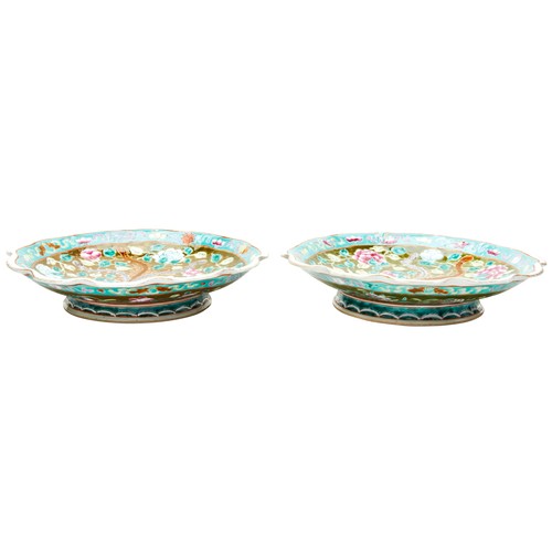 274 - PAIR OF PERANAKAN STRAITS FAMILLE ROSE PORCELAIN FOOTED DISHES19TH CENTURY the brightly painted dish... 