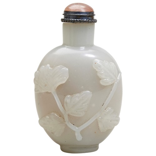 306 - CARVED HARDSTONE 'LOTUS' SNUFF BOTTLELATE QING / REPUBLIC PERIODthe sides carved in high relief with... 