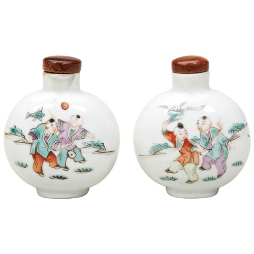 322 - PAIR OF FAMILLE ROSE 'BOYS' SNUFF BOTTLESQING DYNASTY, 19TH CENTURYthe globular sides painted with o... 