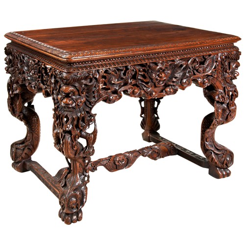 398 - GOOD CARVED HUANGHUALI CENTRE TABLEQING DYNASTY, 19TH CENTURYthe rectangular top with a carved edge,... 