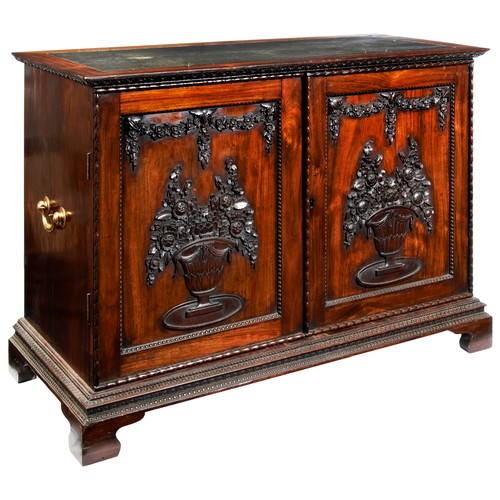 402 - ANGLO-CHINESE CARVED HUANGHUALI LIBRARY CABINETQING DYNASTY, CIRCA 1800the rectangular top with an i... 