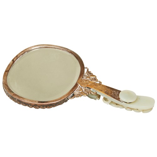 350 - CARVED WHITE AND CELADON-JADE MOUNTED HAND MIRRORQING DYNASTY, 19TH CENTURYTHE handle is a pale gree... 