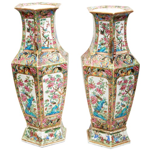 280 - GOOD PAIR OF CANTON FAMILLE ROSE VASESQING DYNASTY, 19TH CENTURYthe hexagonal sides intricately pain... 