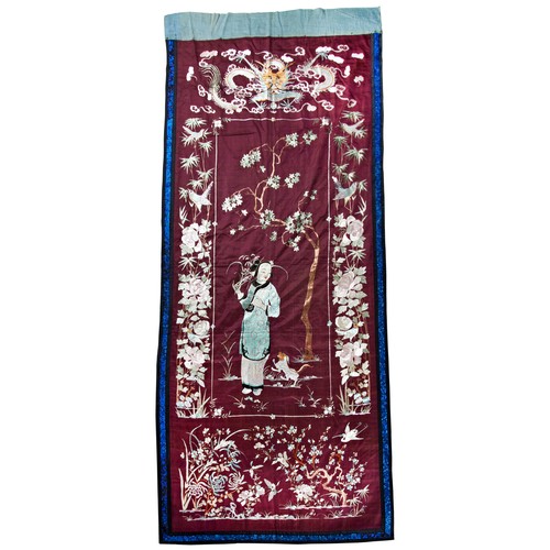 392 - EMBROIDERED SILK HANGINGLATE QING DYNASTYfinely worked in coloured silk thread with an elegant lady ... 