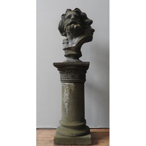 93 - A RECONSTITUTED STONE BUST OF ZEUS ON CORINTHIAN STYLE PILLAR, good weathered aappearance, the pilla... 