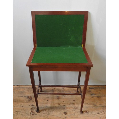 18 - A LATE 19TH CENTURY MAHOGANY INLAID CARD TABLE, the swivel action folding top opens to reveal a baiz... 
