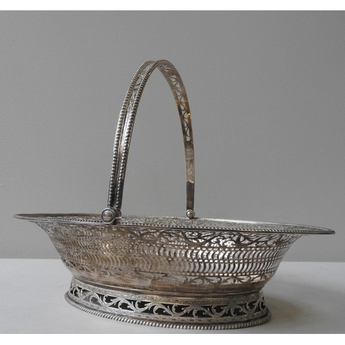 361 - A GEORGE III SILVER FRUIT BASKET, by Richard Meach, London, circa 1779, of elongated oval form with ... 